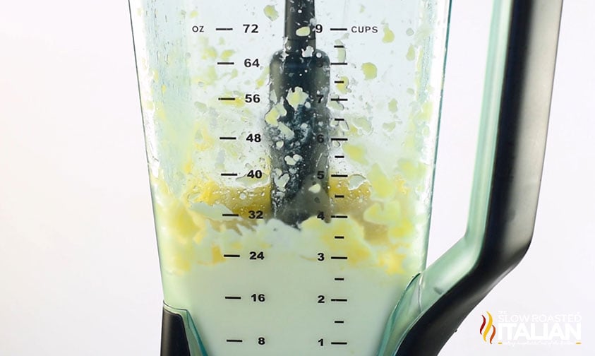 Blending pineapple dole whip ingredients